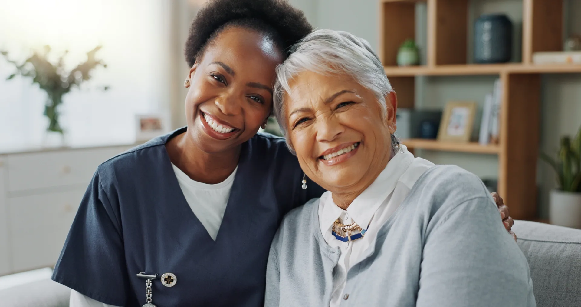 portrait-caregiver-and-woman-on-sofa-in-nursing-h-2024-06-24-16-45-28-utc (Large)
